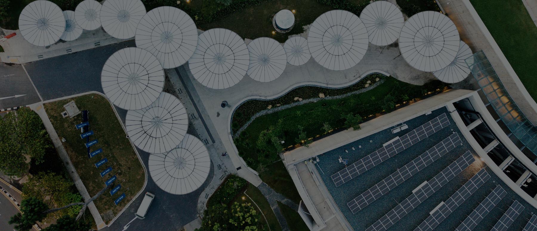 Aerial view of a residential solar installation managed under a full-service campaign